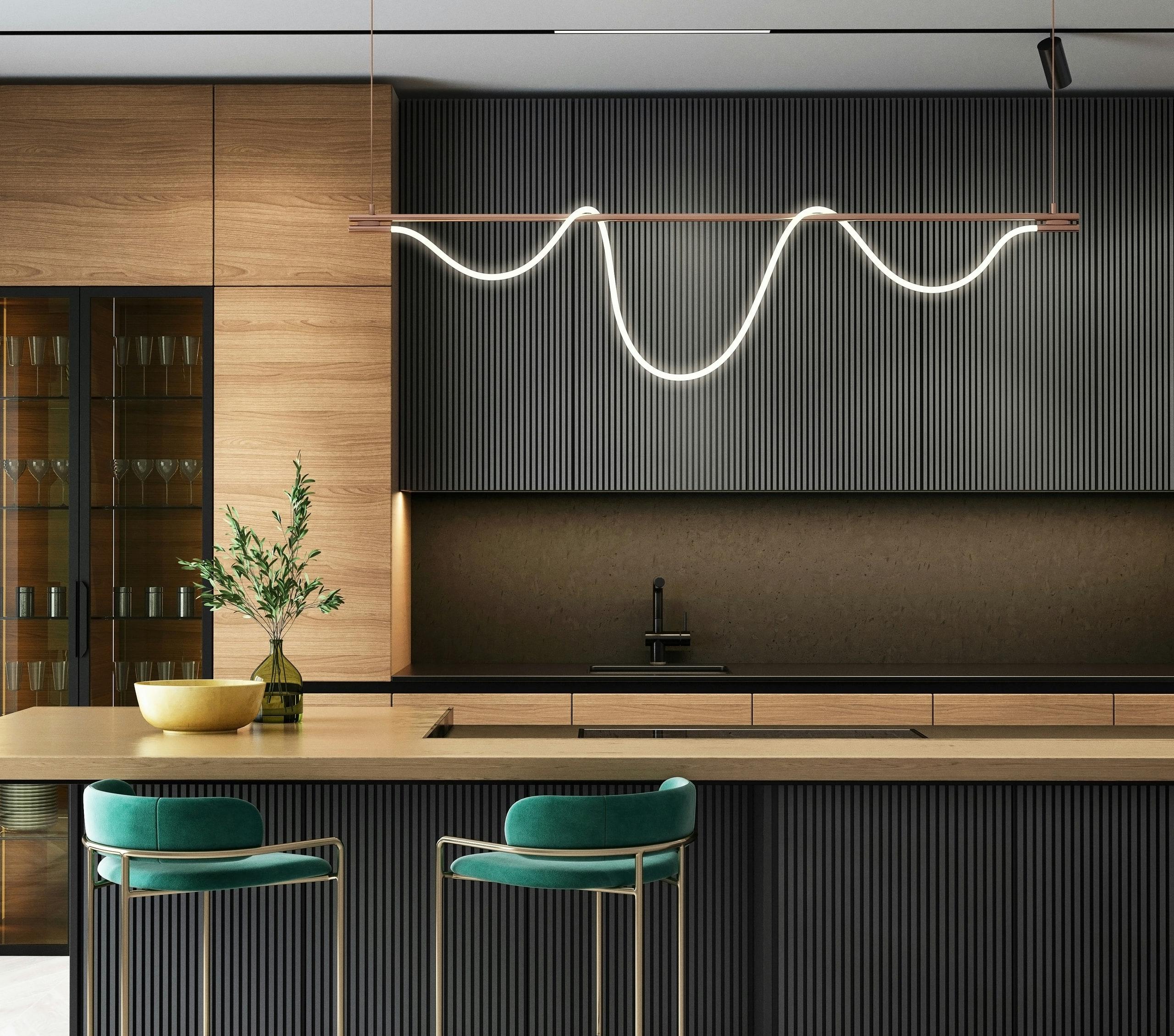 Modern kitchen with a timber island, dark fluted cabinetry and green velvet bar stools